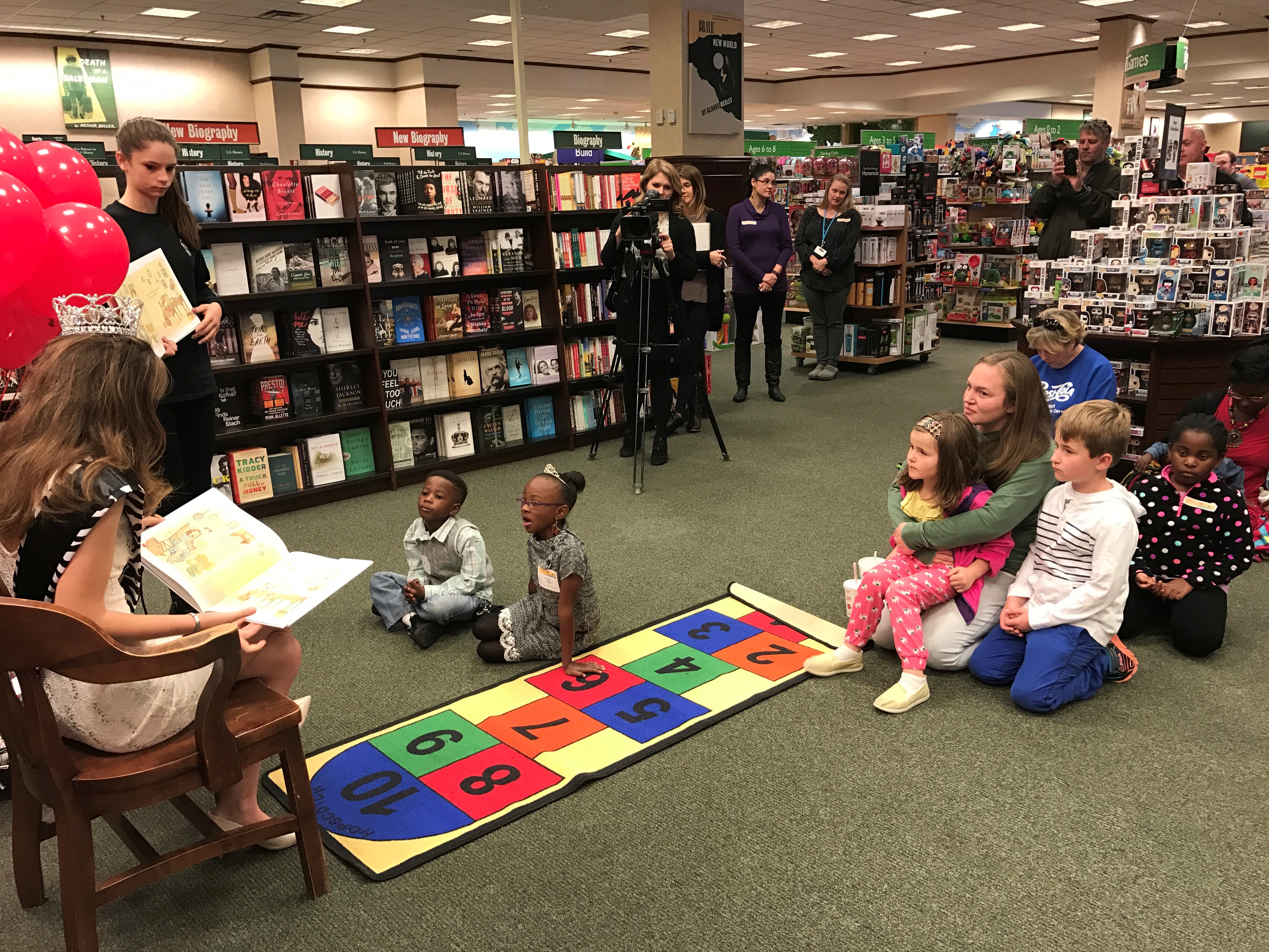 Former Teen Miss North Carolina Tiffany Kessler reads Coat of Many Colors in addition to her book A Caterpillar's Talent Quest, Be Yourself and Nobody Else