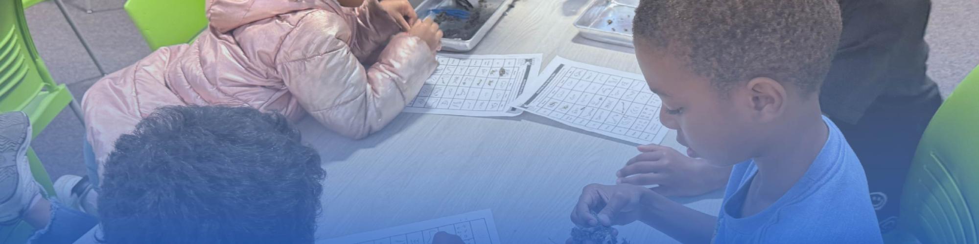 Students participating in a STEAM activity together